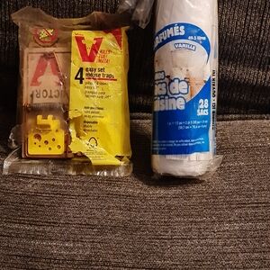 Yellow Mouse Traps and White Trash Bags